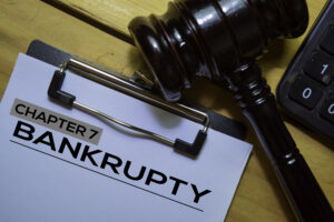 Bankcrupty Chapter 7 text on Document form and Gavel isolated on office desk. What Is Chapter 7 Bankruptcy?